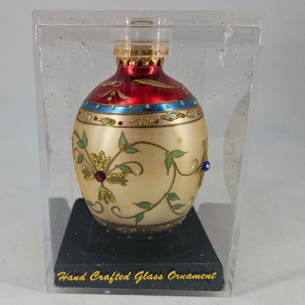 Hand Crafted Glass egg shaped Christmas Ornament Unique Treasures
